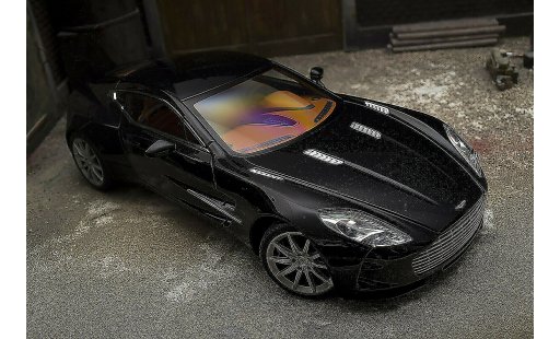 Aston Martin One-77 coupe 1/18 Autoart 77 zwart pearl interieur oranje modelauto