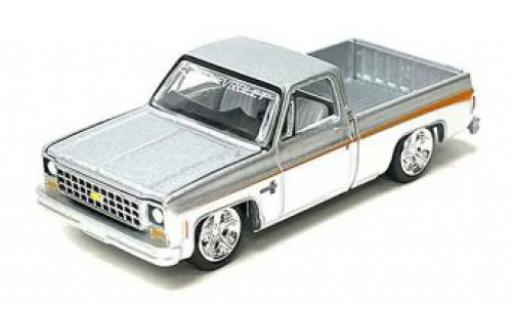 Modelauto Chevrolet Silverado pickup d 1980 1/64 Auto World