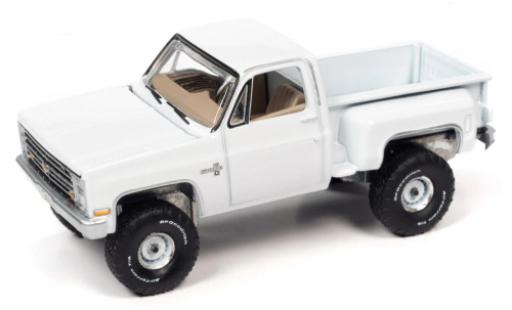 Modelauto Chevrolet Silverado pickup K10 Stepside wit 1986 1/64 Auto World