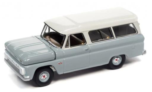 Modelauto Chevrolet Suburban suv grijs /wit 1966 1/64 Auto World
