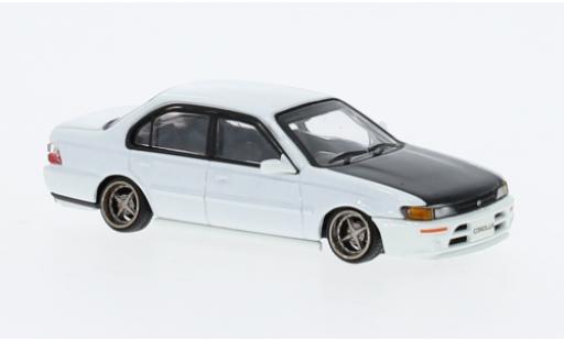 Modelauto Toyota Corolla AE100 wit 1996 1/64 BM Creations