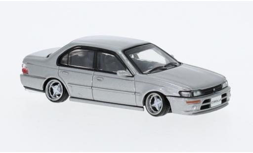 Modelauto Toyota Corolla AE100 metallic grijs 1996 1/64 BM Creations