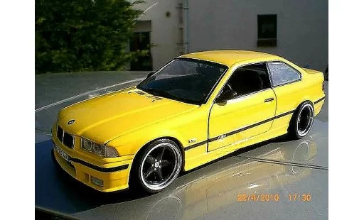 Bmw M3 coupe 1/18 Ut Models jaune E36 jantes ac schnitzer 18 pouces modelauto