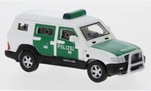 Modelauto Toyota Land Cruiser Survivor Politie 2004 1/87 BoS Models