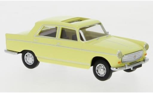 Modelauto Peugeot 404 Berline geel 1961 toit ouvrant ougroen 1/87 Brekina