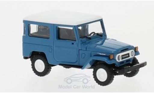 Modelauto Toyota Land Cruiser 40 J4 blauw/wit 1/87 Busch