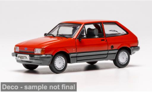 Modelauto Ford Fiesta Berline MK II rood 1984 1/43 IXO