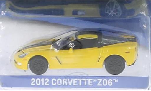 Modelauto Chevrolet Corvette Z06 geel/zwart 2012 zonder Vitrine 1/64 Greenlight
