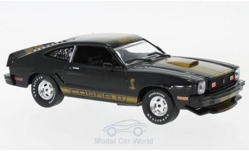 Modelauto Ford Mustang Cobra II zwart/gold 1977 1/43 Greenlight