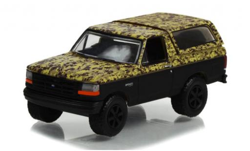 Modelauto Ford Bronco Wagon Dekor/zwart 1996 1/64 Greenlight