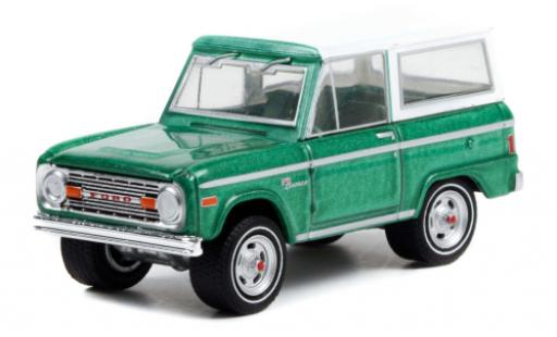 Modelauto Ford Bronco Wagon metallic groen/wit 1977 1/64 Greenlight