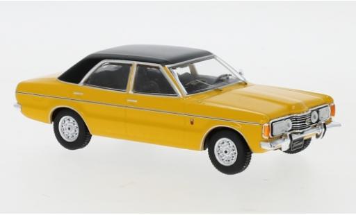 Modelauto Ford Taunus TC1 GLX geel/zwart 1973 1/43 IXO