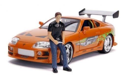 Modelauto Toyota Supra Fast & Furious metallic oranje/Dekor 1995 avec figurine et Scheinwerferfunktion 1/18 Jada Toys