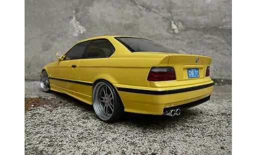 Bmw M3 coupe 1/18 Ut Models jaune E36 jantes alu tuning modelauto