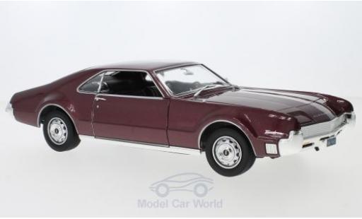 Modelauto Oldsmobile Toronado Base metallic rood 1966 zonder Vitrine 1/18 Lucky Die Cast