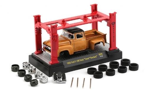 Modelauto Ford F-100 Pickup 00 metallic koper/zwart 1956 Foose Overlord avec Hebeb&Atilde;&frac14;hne et 2 Rads&Atilde;&curren;tzen 1/64 M2 Machines