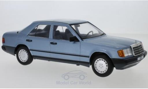 Modelauto Mercedes 300 Coupe E (W124) metallic blauw 1984 1/18 MCG