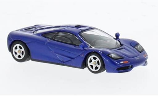 Modelauto McLaren F1 Base blauw 1/64 Mini GT