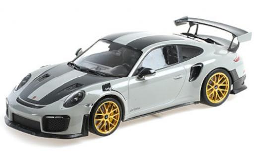 Modelauto Porsche 911 GT2 RS (991.2) grijs/carbon 2018 met Weissach Paket en goldenen Magnesium Felgen 1/18 Minichamps