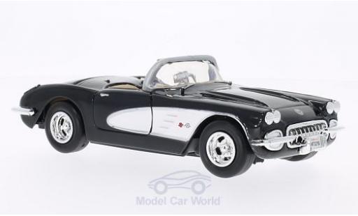 Modelauto Chevrolet Corvette Convertible (C1) zwart/wit 1959 zonder Vitrine 1/24 Motormax