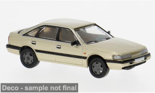 Modelauto Mazda 626 Base 2 beige 1987 1/87 PCX87