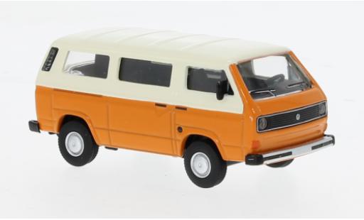 Modelauto Volkswagen T3 Base Bus oranje/beige 1/64 Schuco