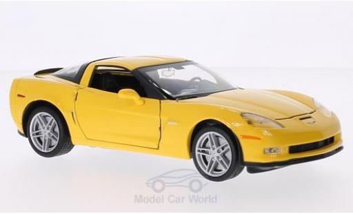 Modelauto Chevrolet Corvette Z06 (C5) geel 2007 1/24 Welly