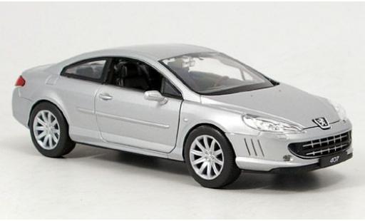Modelauto Peugeot 407 Coupe grijs sans Vitrine 1/24 Welly