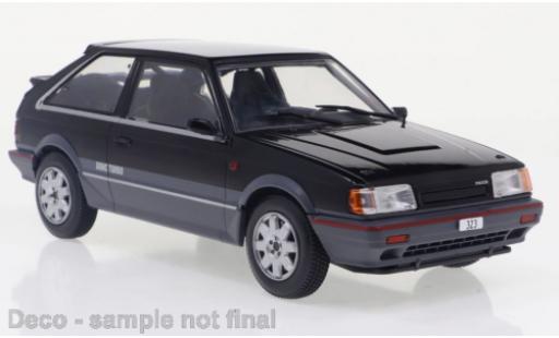 Modelauto Mazda 323 4WD Turbo zwart/metallic grijs 1989 1/24 WhiteBox