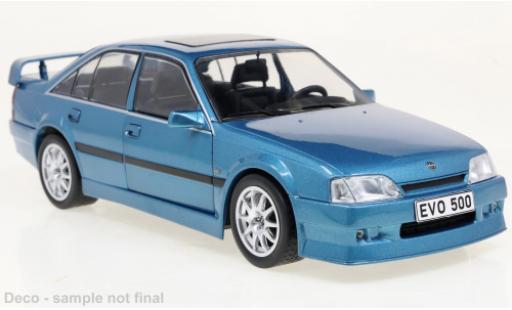 Modelauto Opel Omega Evolution 500 metallic blauw 1991 1/24 WhiteBox
